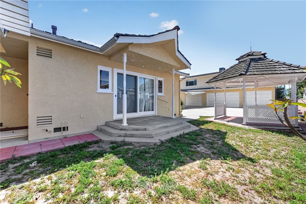 9470-9472 Foster Road Bellflower, CA 90706 - Photo 32 of 61 back yard and entrance