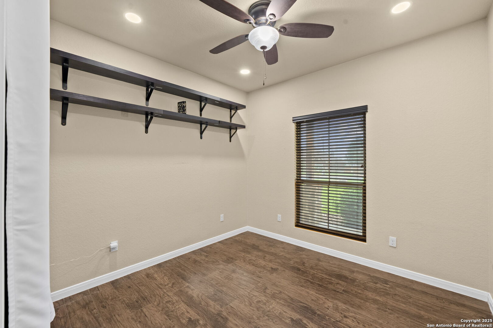622 North Dickson Street Poth, TX 78147 - Photo 19 of 60 a view of an empty room with a window