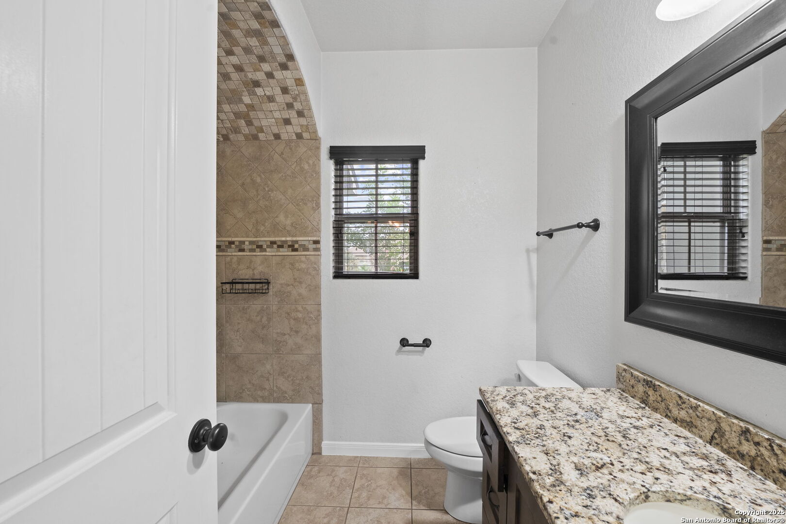 622 North Dickson Street Poth, TX 78147 - Photo 21 of 60 a bathroom with a sink toilet and shower