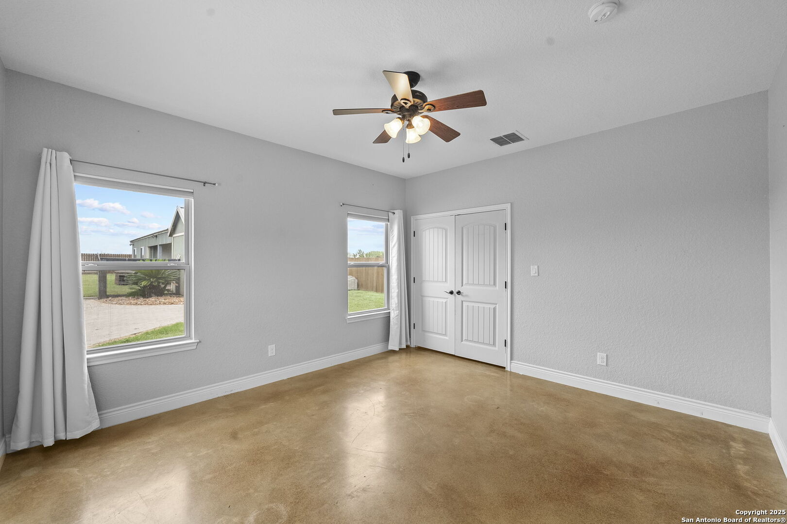 622 North Dickson Street Poth, TX 78147 - Photo 44 of 60 a view of an empty room with a window