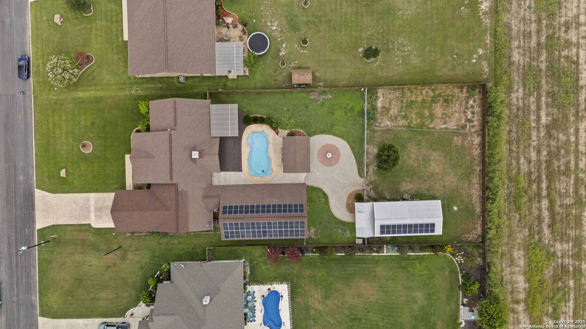 622 North Dickson Street Poth, TX 78147 - Photo 60 of 60 an aerial view of a house with swimming pool and outdoor space