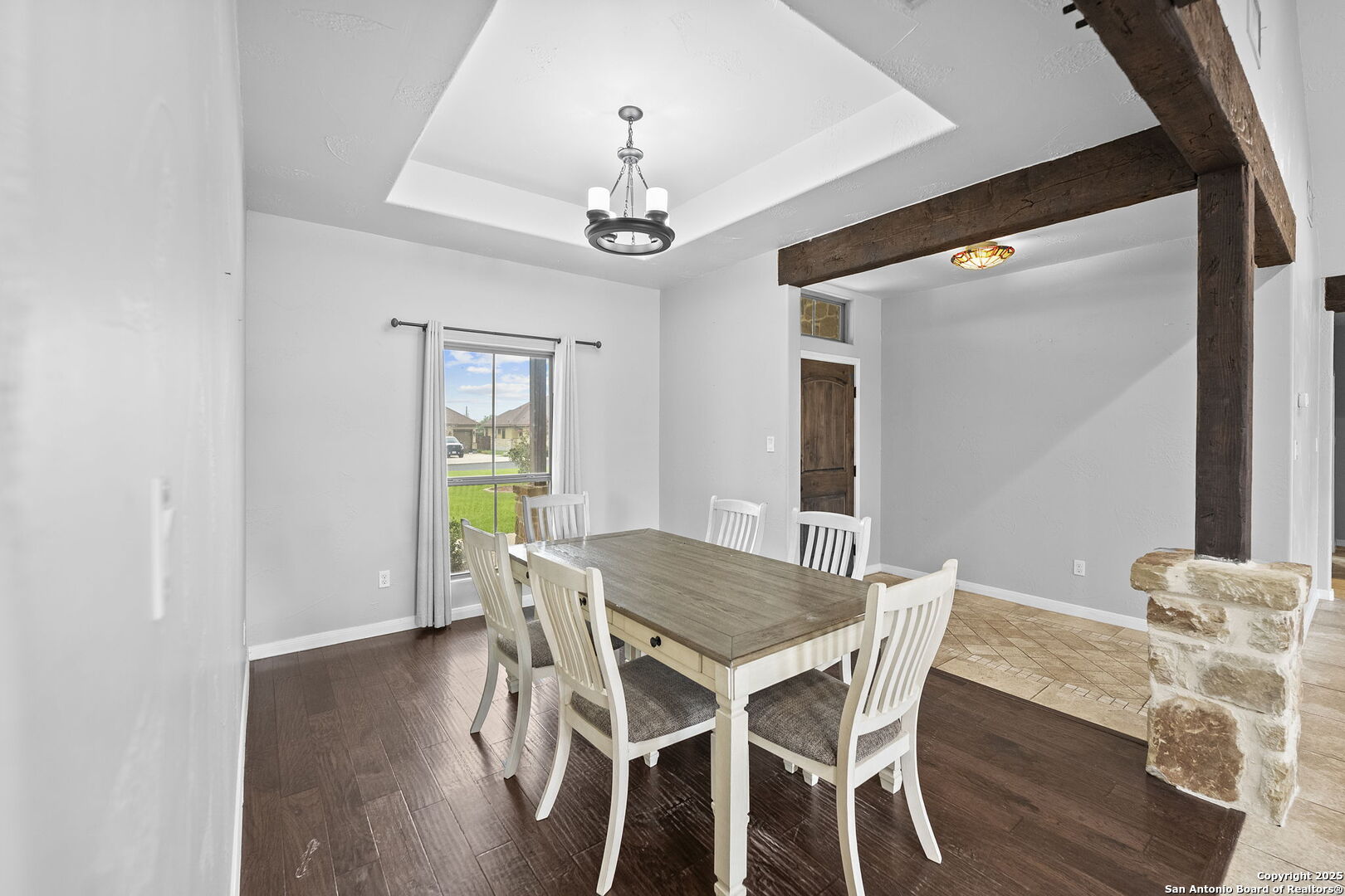 622 North Dickson Street Poth, TX 78147 - Photo 9 of 60 a view of a dining room with furniture and wooden floor
