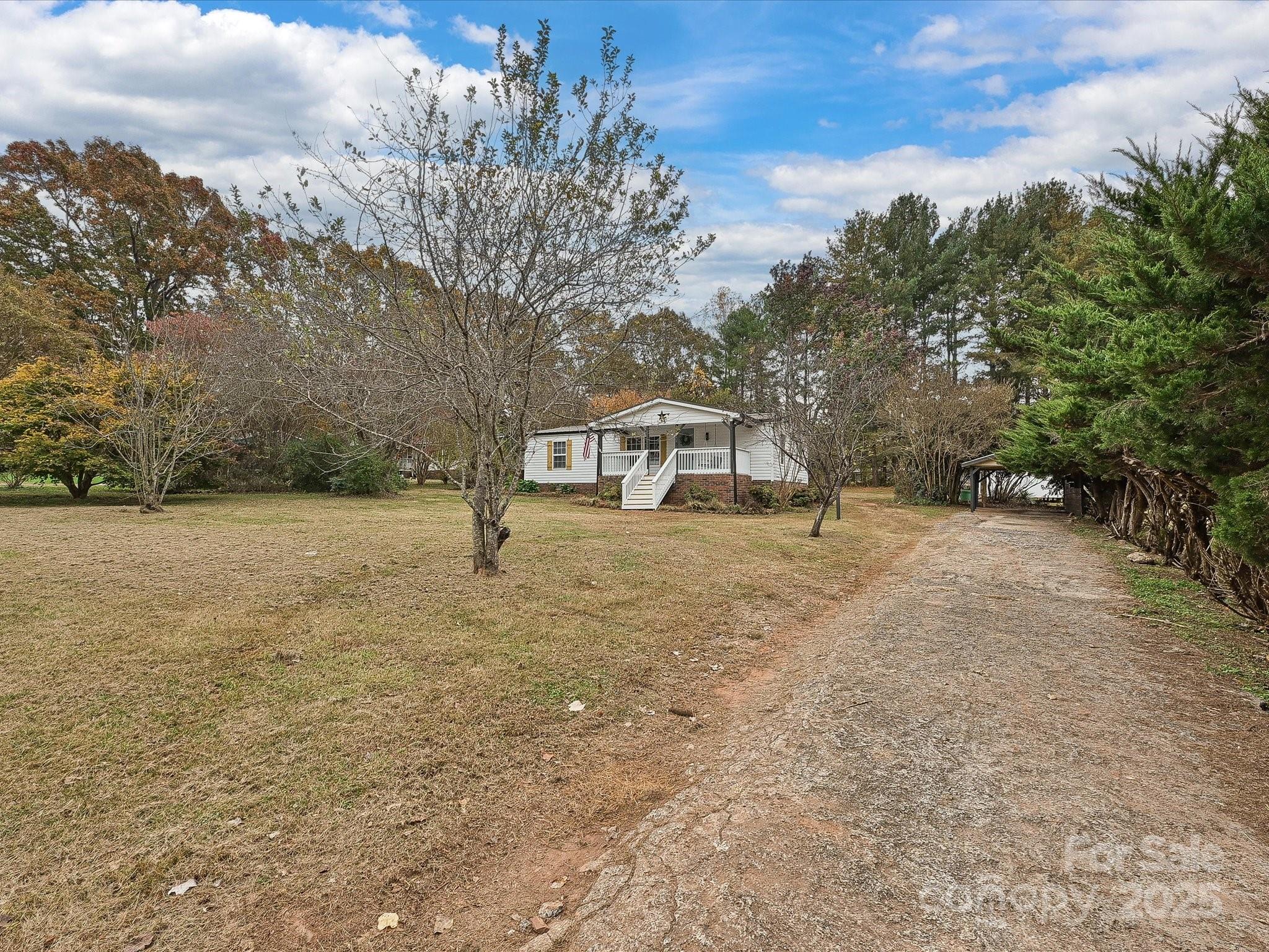 3318 Loop Road Lincolnton, NC 28092 - Photo 26 of 27 a front view of a house with a yard