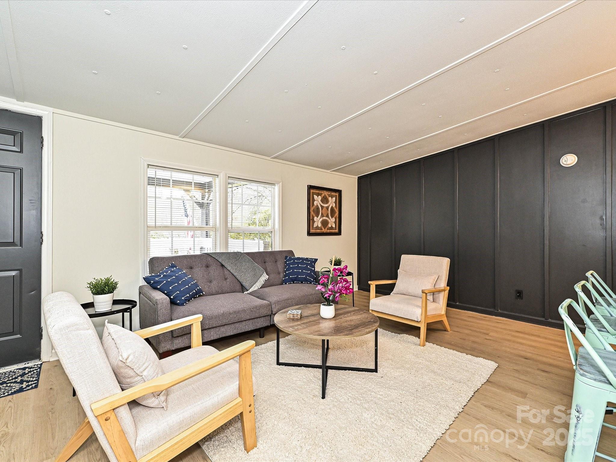 3318 Loop Road Lincolnton, NC 28092 - Photo 4 of 27 a living room with furniture and a window