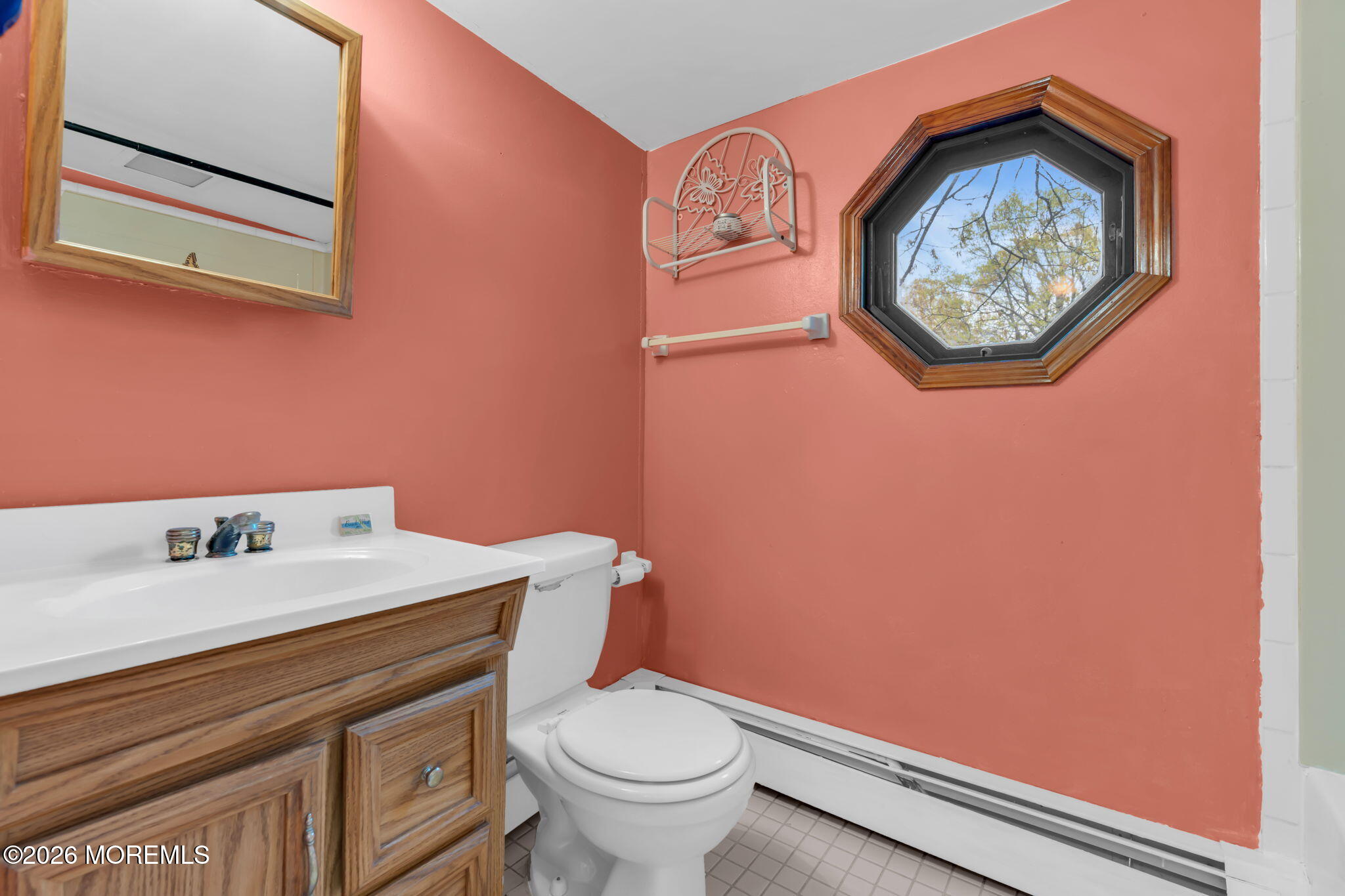 109 Martin Road Toms River, NJ 08753 - Photo 30 of 34 a bathroom with a toilet a sink and mirror