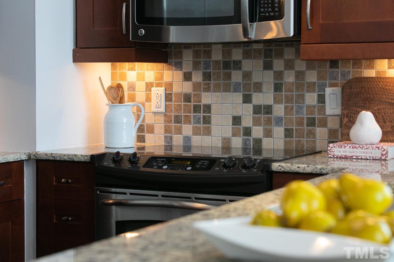 2608 Erwin Road, Unit 402 Durham, NC 27705 - Photo 12 of 33 a bathroom with a bathtub and a sink
