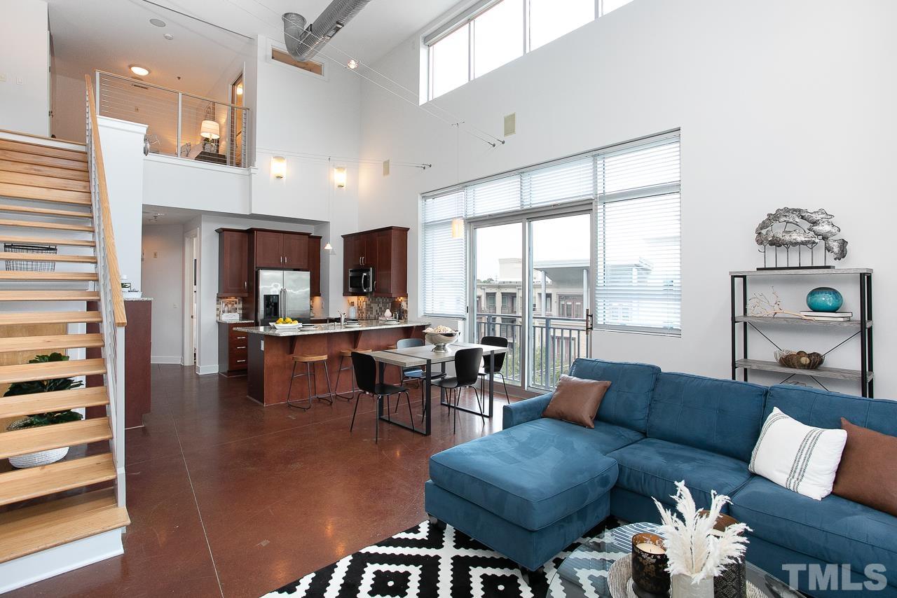 2608 Erwin Road, Unit 402 Durham, NC 27705 - Photo 16 of 33 a living room with furniture and a large window