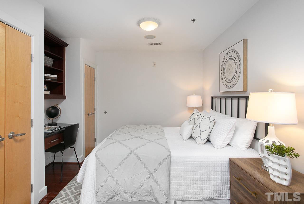 2608 Erwin Road, Unit 402 Durham, NC 27705 - Photo 17 of 33 a bedroom with a bed and a window