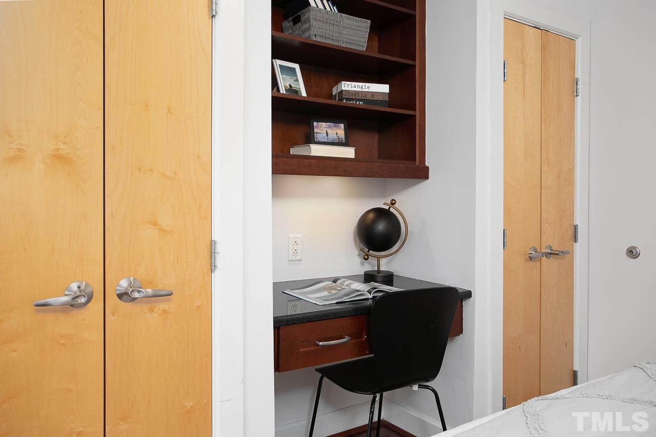 2608 Erwin Road, Unit 402 Durham, NC 27705 - Photo 18 of 33 a view of a bathroom with a sink and a mirror