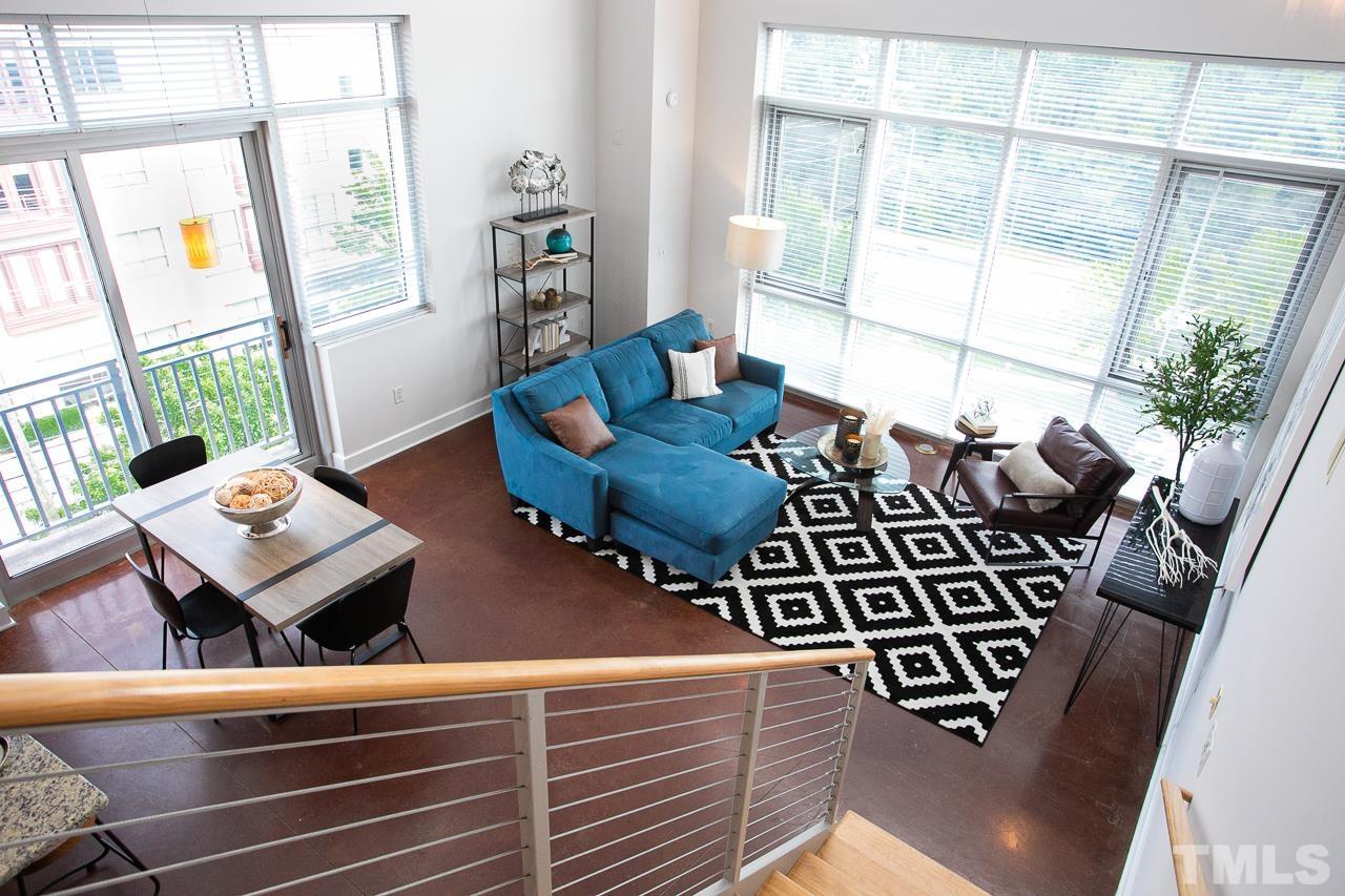 2608 Erwin Road, Unit 402 Durham, NC 27705 - Photo 2 of 33 a reading room with furniture and wooden floor