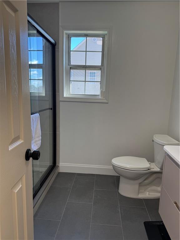 790 Hiram Davis Road Lawrenceville, GA 30045 - Photo 18 of 21 a bathroom with a toilet and a shower