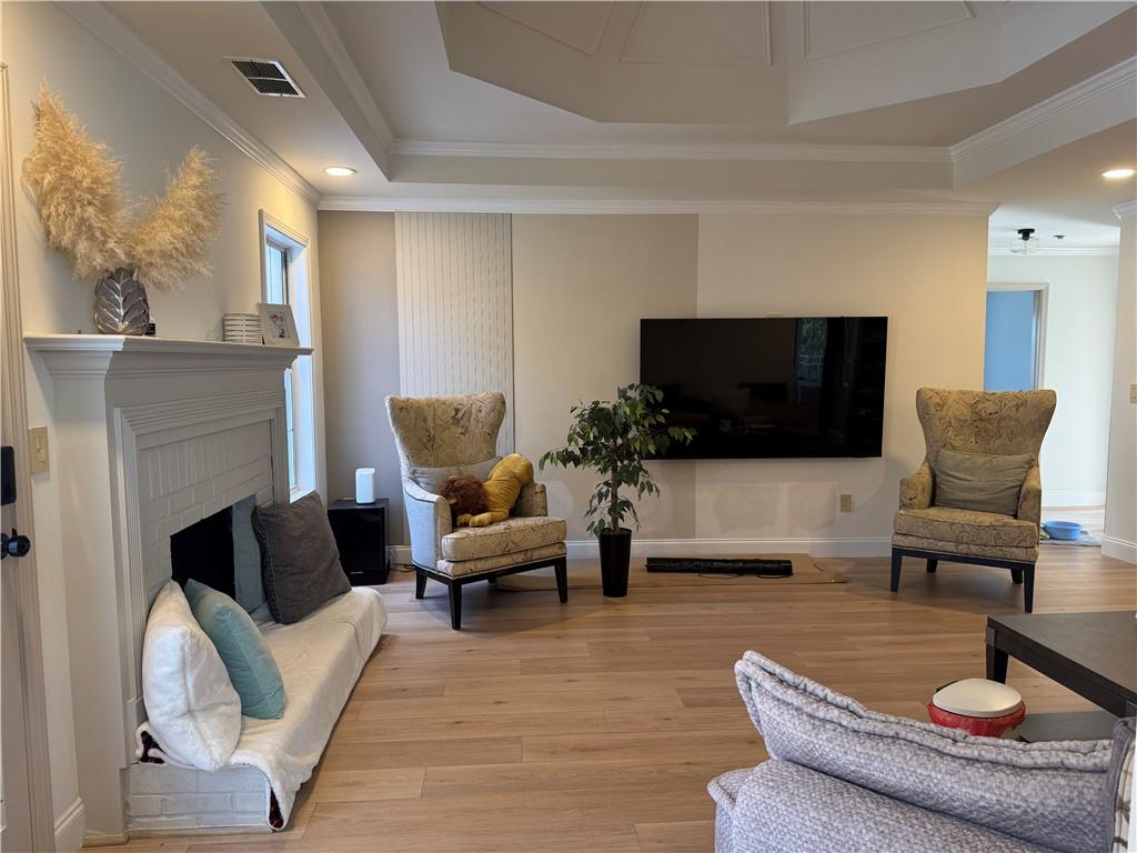 790 Hiram Davis Road Lawrenceville, GA 30045 - Photo 3 of 21 a living room with furniture and a flat screen tv