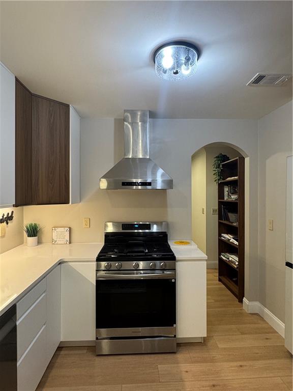 790 Hiram Davis Road Lawrenceville, GA 30045 - Photo 6 of 21 a kitchen with a stove and a sink