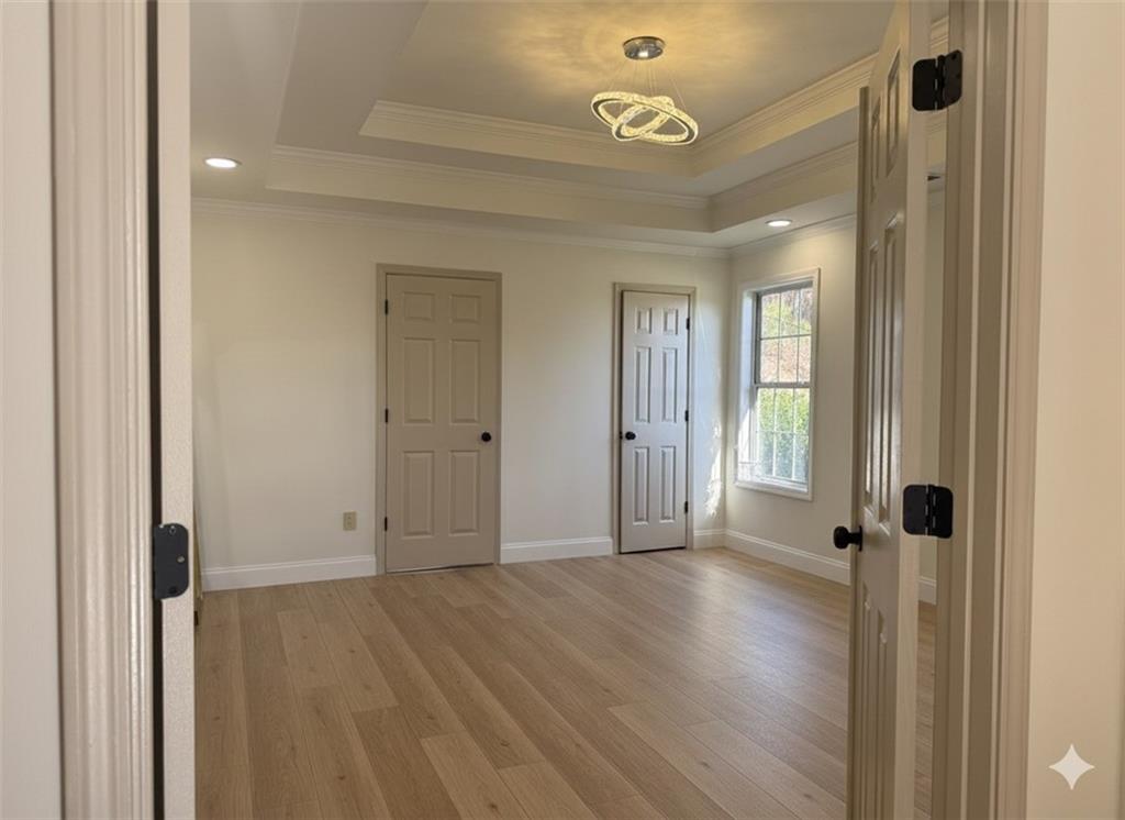 790 Hiram Davis Road Lawrenceville, GA 30045 - Photo 10 of 21 a view of a hallway with wooden floor