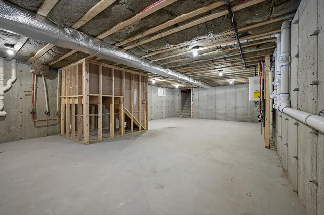 a view of an empty room with a garage