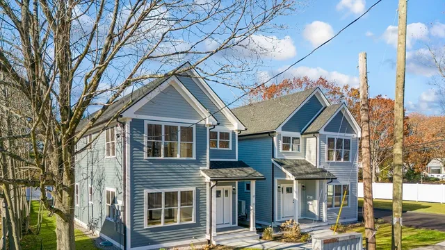 a front view of a house with street
