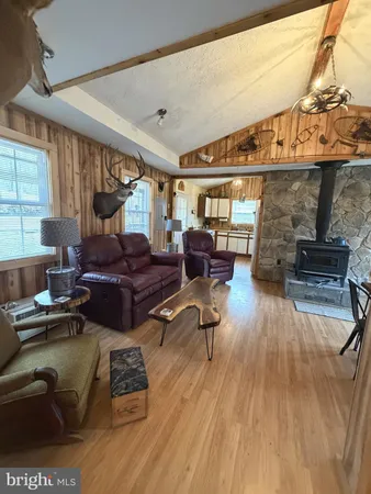 a view of a dining room with furniture and window