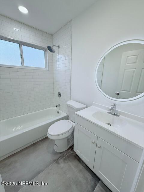 2160 Rothbury Drive Jacksonville, FL 32221 - Photo 25 of 31 a bathroom with a toilet a sink a mirror and bathtub