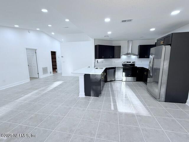 2160 Rothbury Drive Jacksonville, FL 32221 - Photo 7 of 31 a large kitchen with stainless steel appliances a refrigerator and a microwave