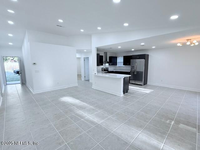 2160 Rothbury Drive Jacksonville, FL 32221 - Photo 8 of 31 a view of kitchen with kitchen island stainless steel appliances refrigerator sink and cabinets