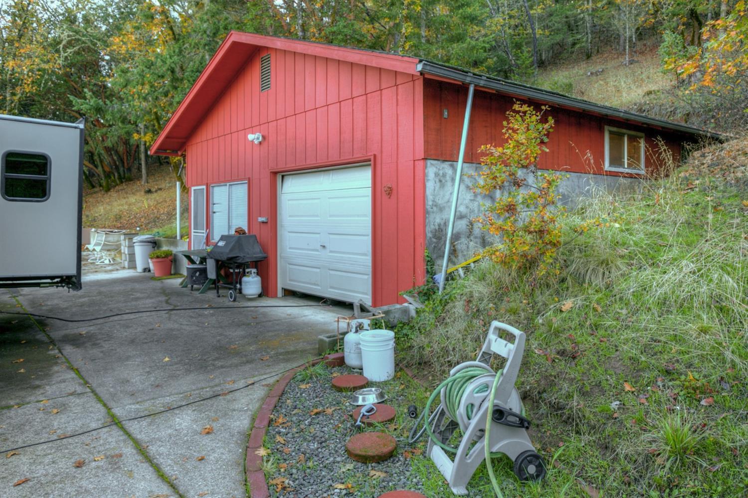 3771 Old Military Road Central Point, OR 97502 - Photo 18 of 19 a view of backyard of house with seating space