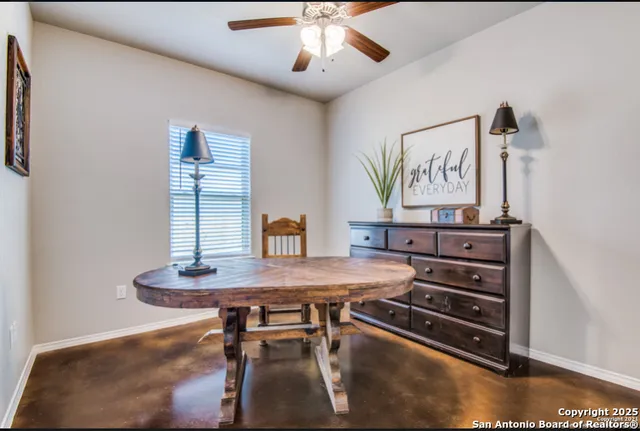 a view of a dining room with furniture