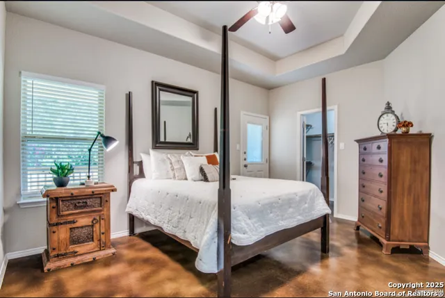 a bed room with a bed and dresser