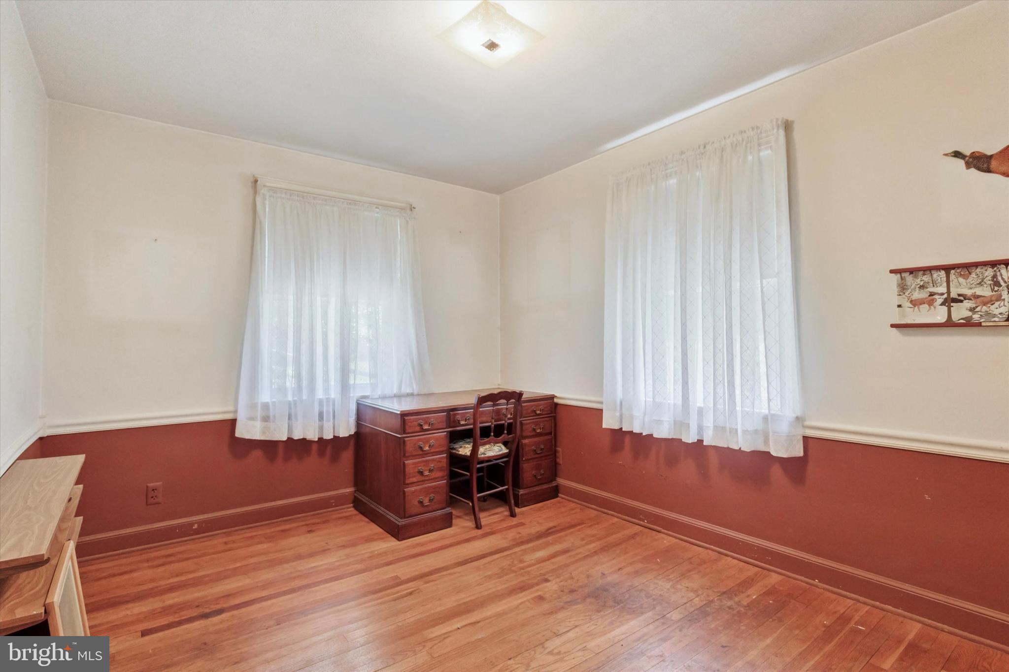 350 Dowlin Forge Road Exton, PA 19341 - Photo 15 of 27 a view of room with window and wooden floor