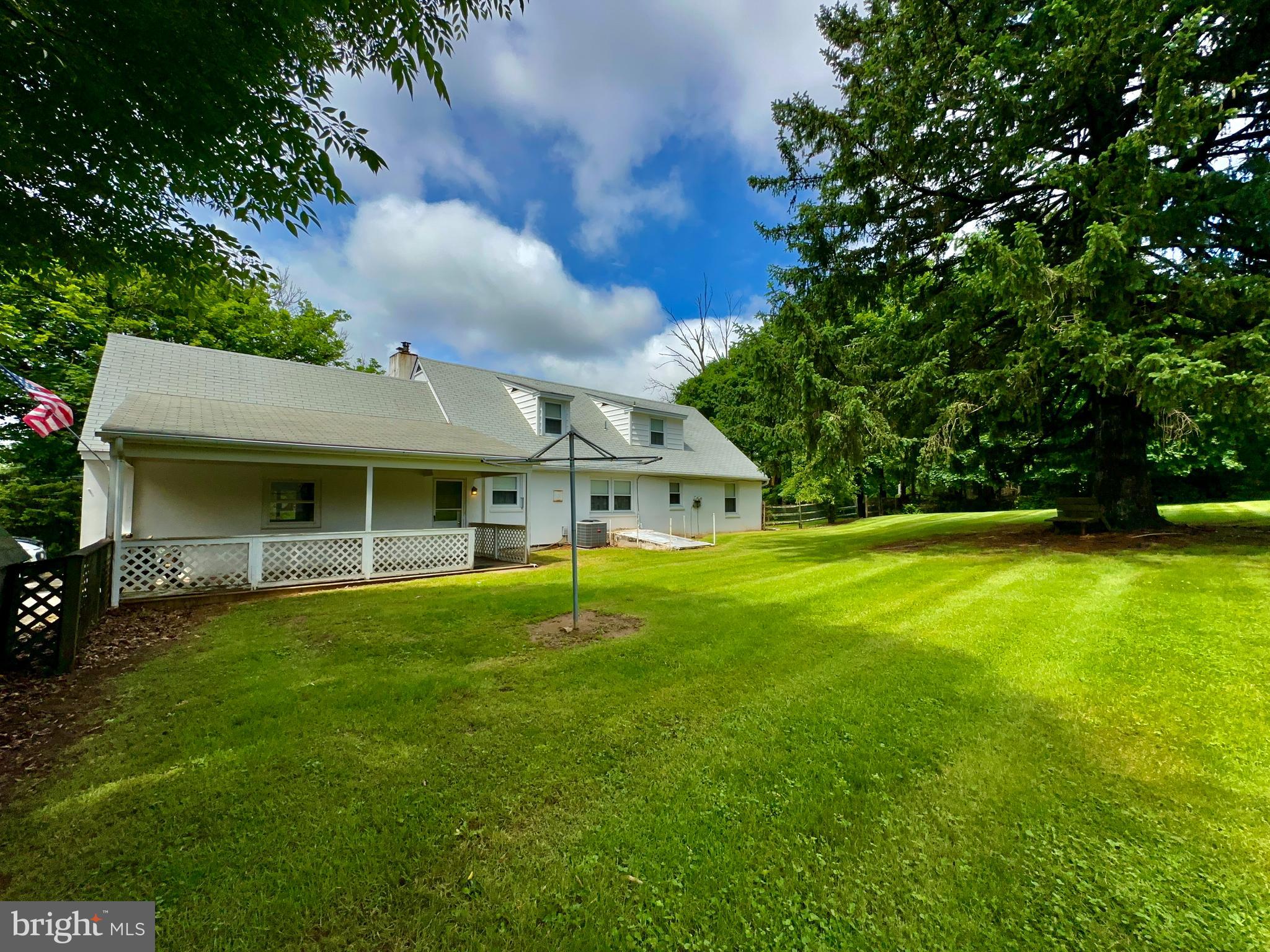 350 Dowlin Forge Road Exton, PA 19341 - Photo 26 of 27 a front view of a house with a garden