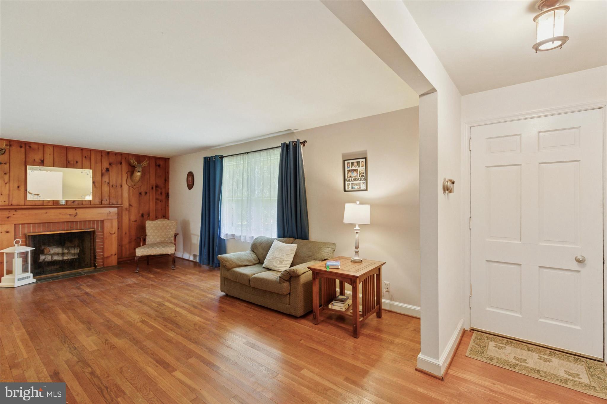350 Dowlin Forge Road Exton, PA 19341 - Photo 7 of 27 a living room with furniture and a fireplace