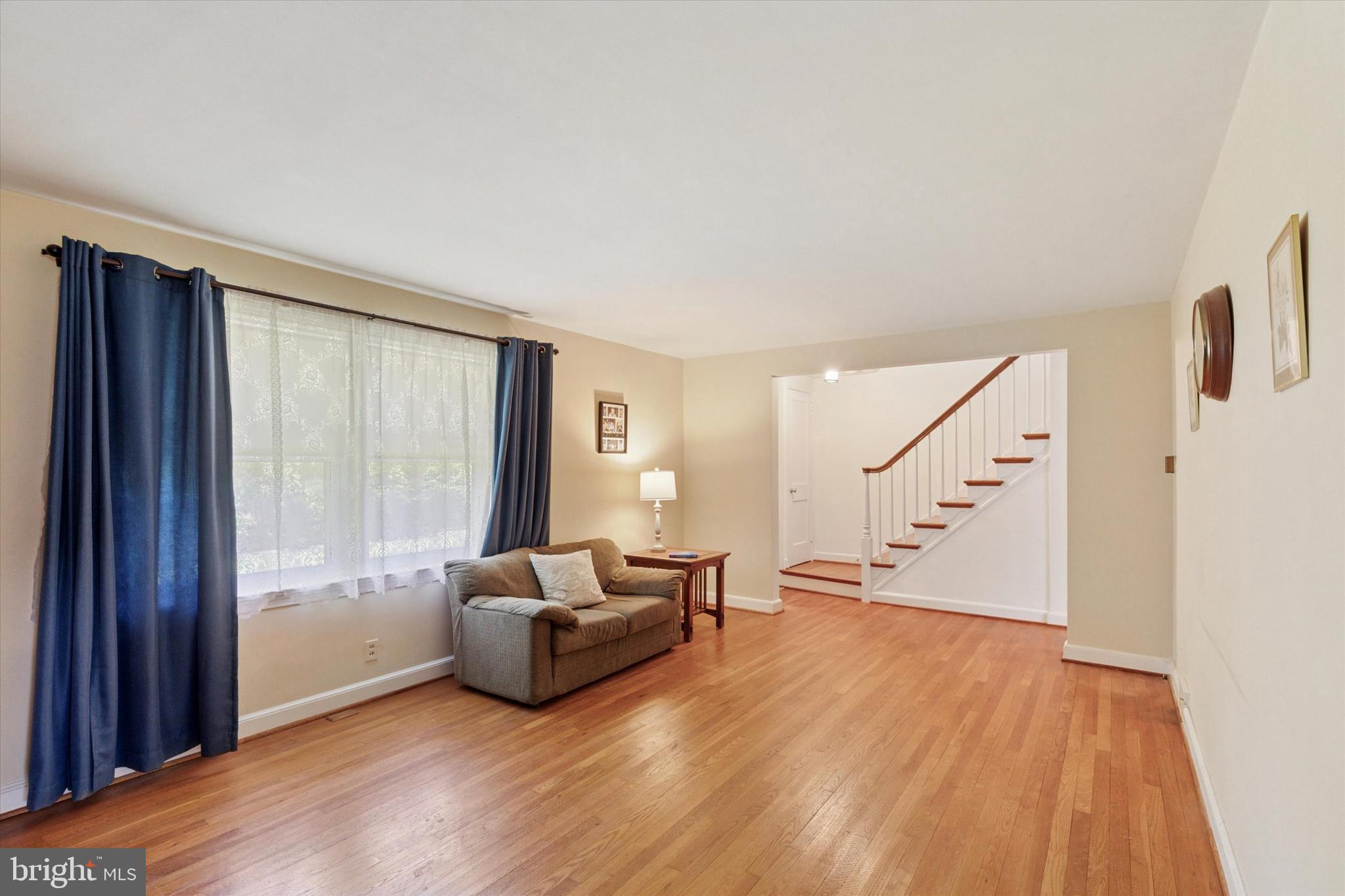 350 Dowlin Forge Road Exton, PA 19341 - Photo 9 of 27 a living room with furniture and a large window