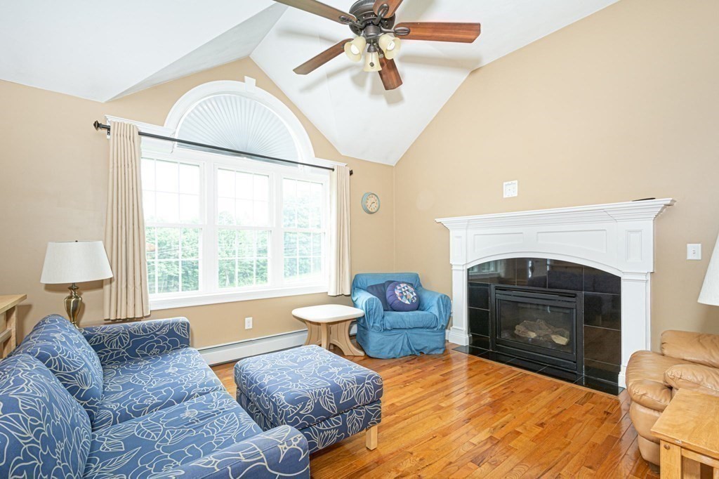 280 Maple Avenue Rutland, MA 01543 - Photo 18 of 35 a living room with furniture and a fireplace