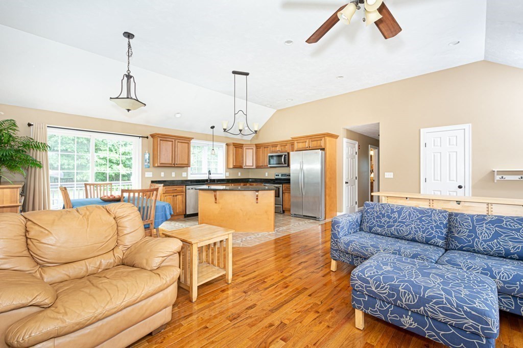 280 Maple Avenue Rutland, MA 01543 - Photo 21 of 35 a living room with furniture and a chandelier