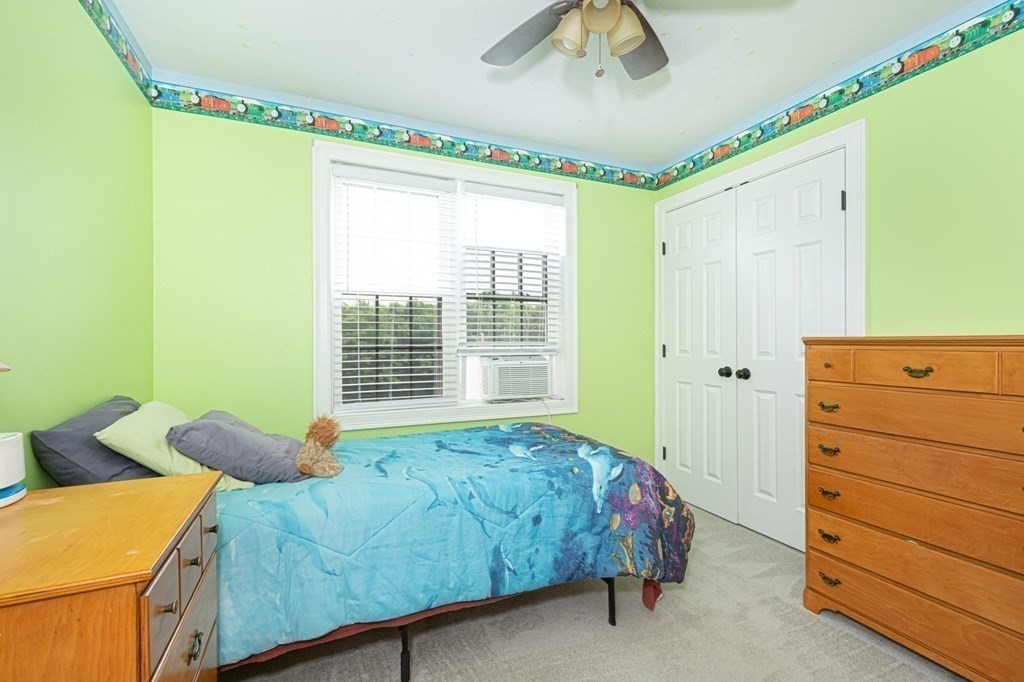 280 Maple Avenue Rutland, MA 01543 - Photo 25 of 35 a bedroom with a bed and a window