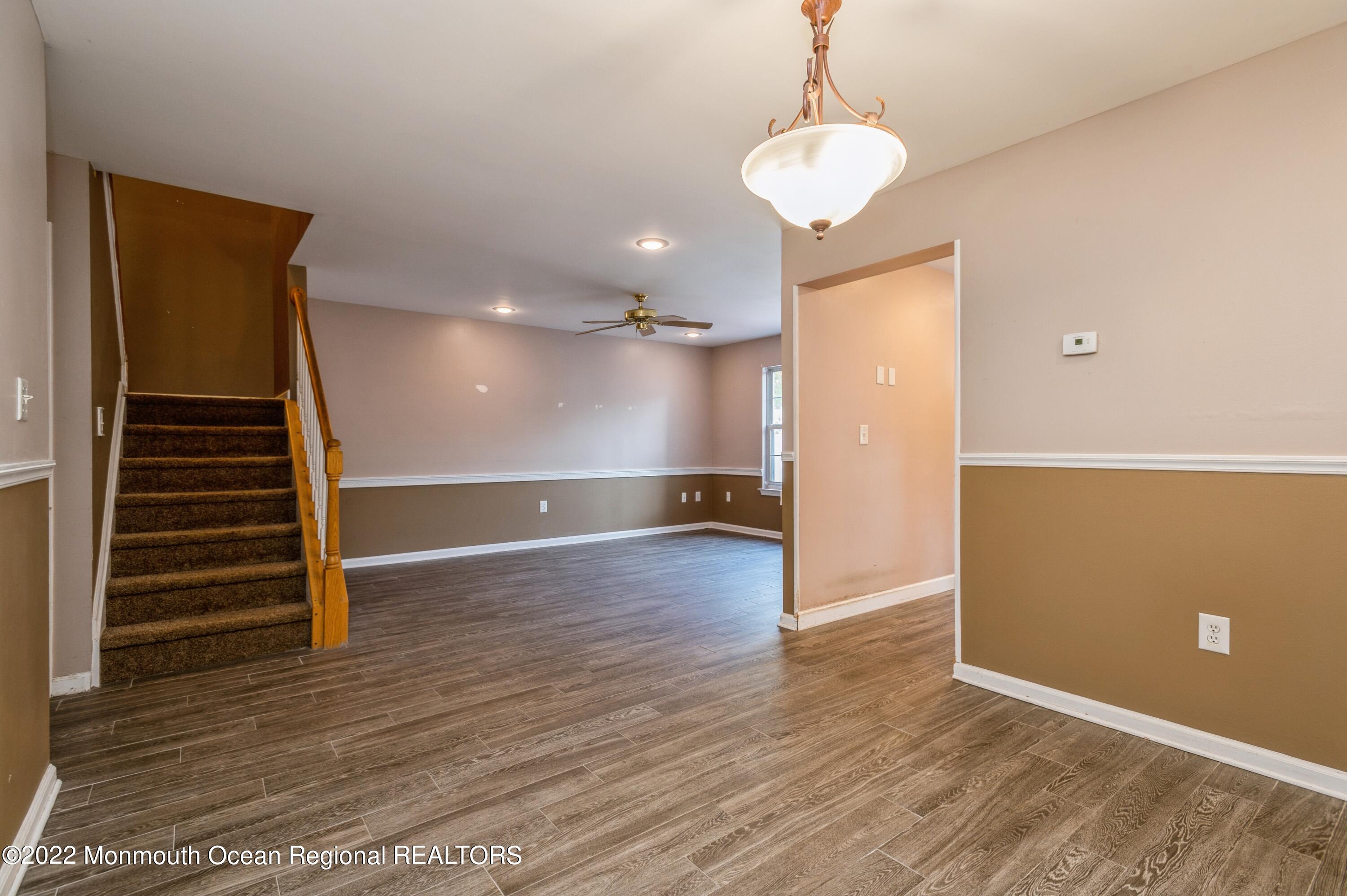 48 Alpine Road Holmdel, NJ 07733 - Photo 13 of 20 an empty room with wooden floor and windows