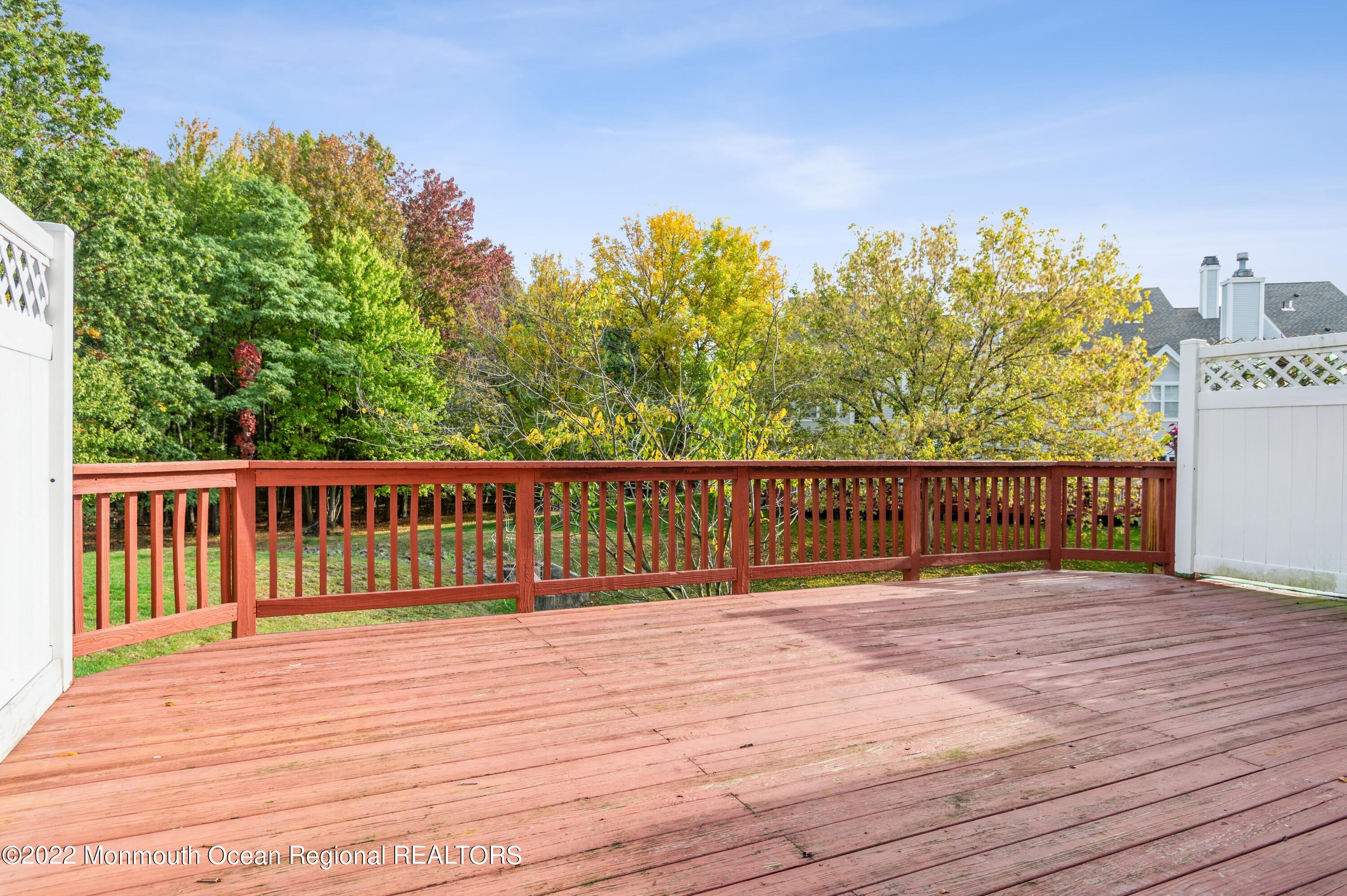 48 Alpine Road Holmdel, NJ 07733 - Photo 10 of 20 a view of a deck with a yard