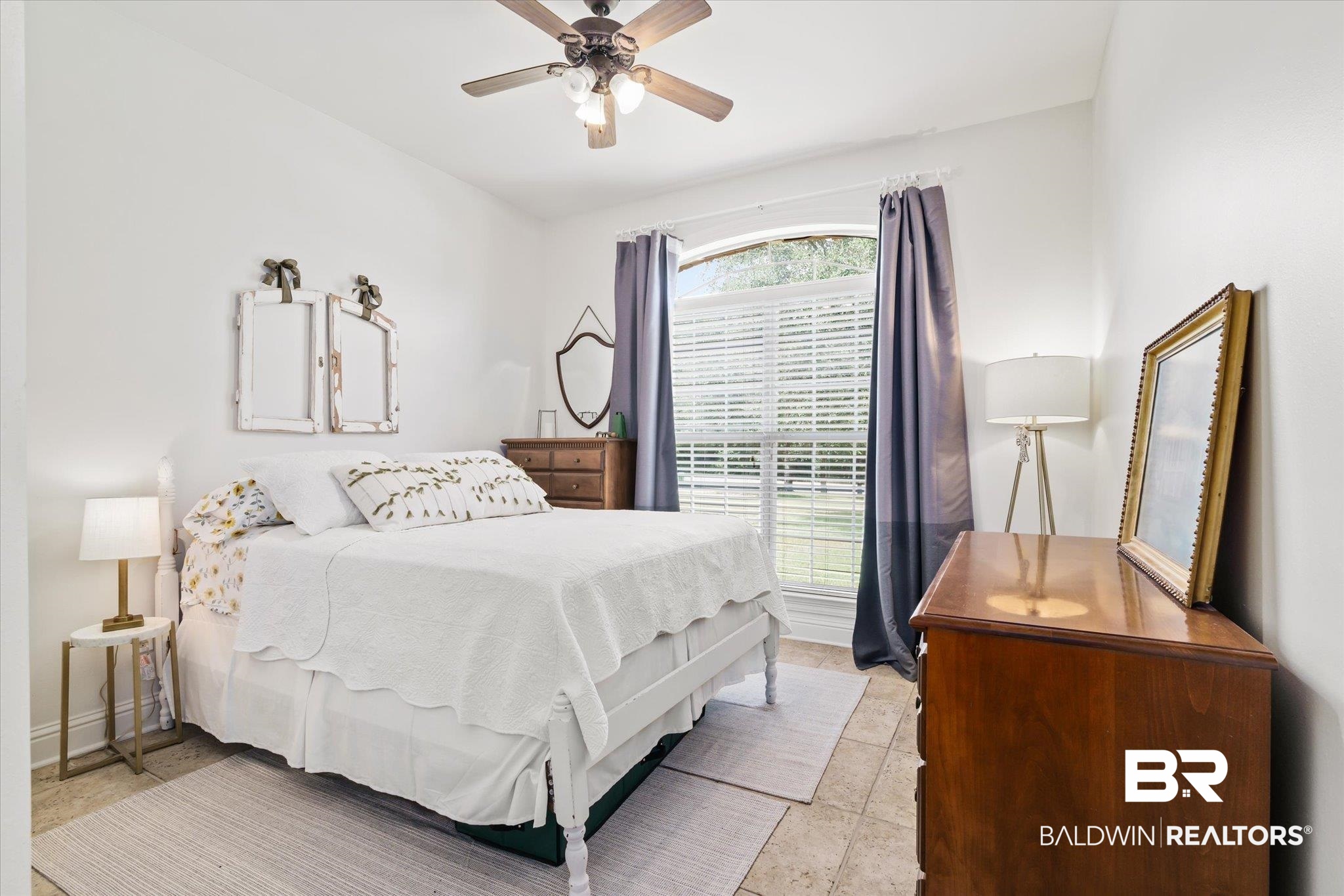 8840 Celeste Road Saraland, AL 36571 - Photo 19 of 43 Bedroom featuring ceiling fan