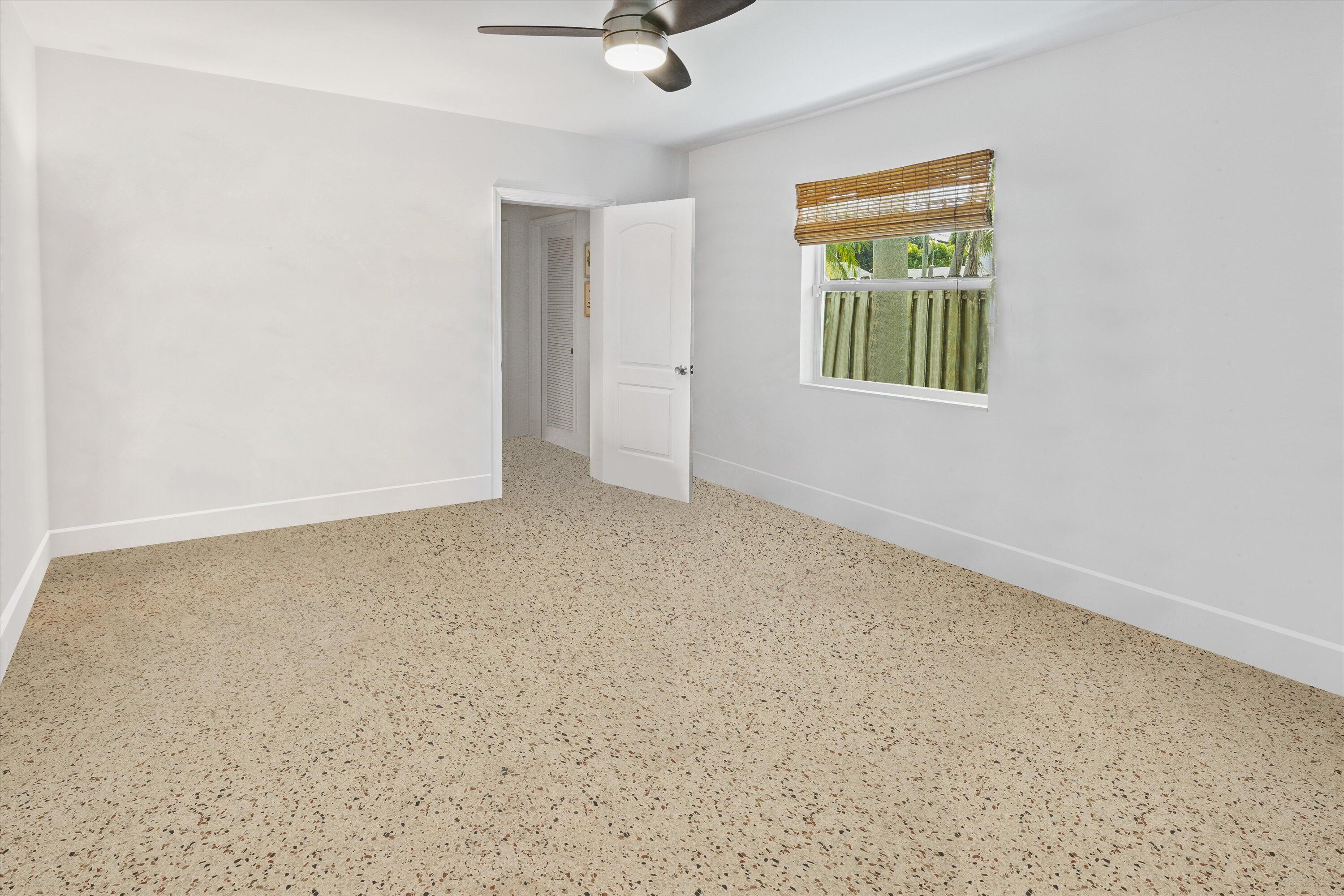 202 32nd Street West Palm Beach, FL 33407 - Photo 17 of 44 an empty room with windows