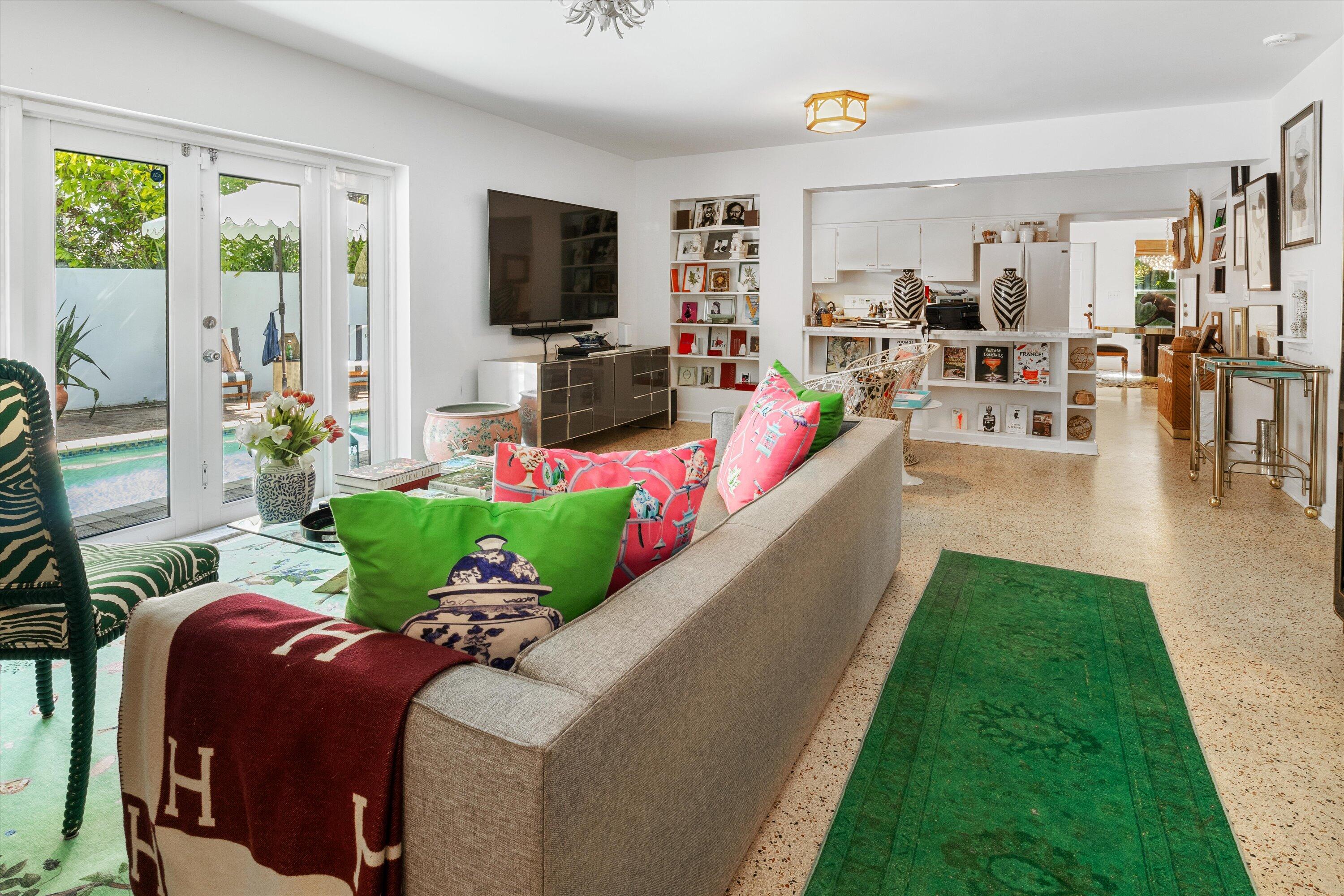 202 32nd Street West Palm Beach, FL 33407 - Photo 21 of 44 a living room with furniture fireplace and a flat screen tv