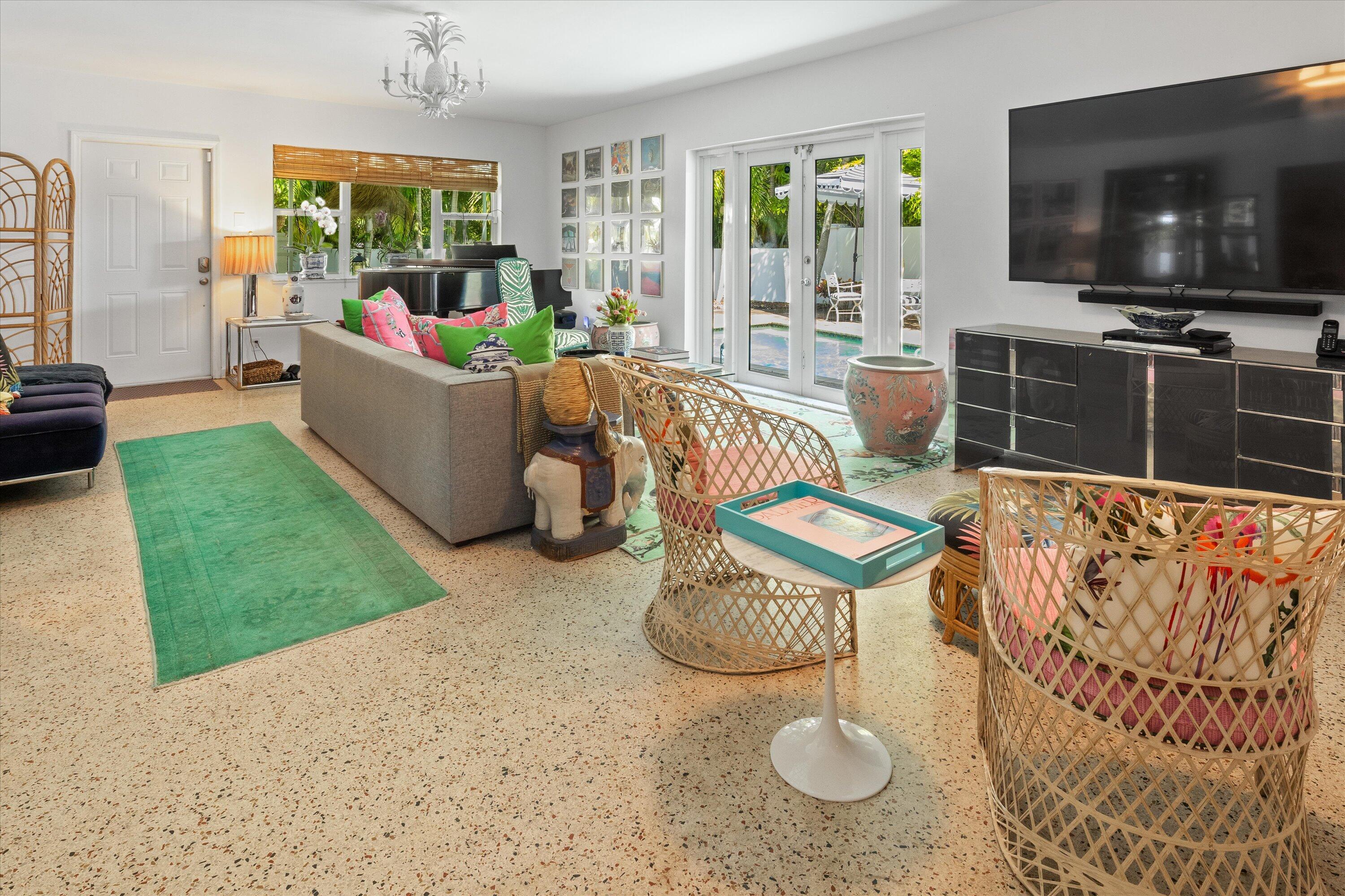 202 32nd Street West Palm Beach, FL 33407 - Photo 22 of 44 a living room with furniture and a flat screen tv
