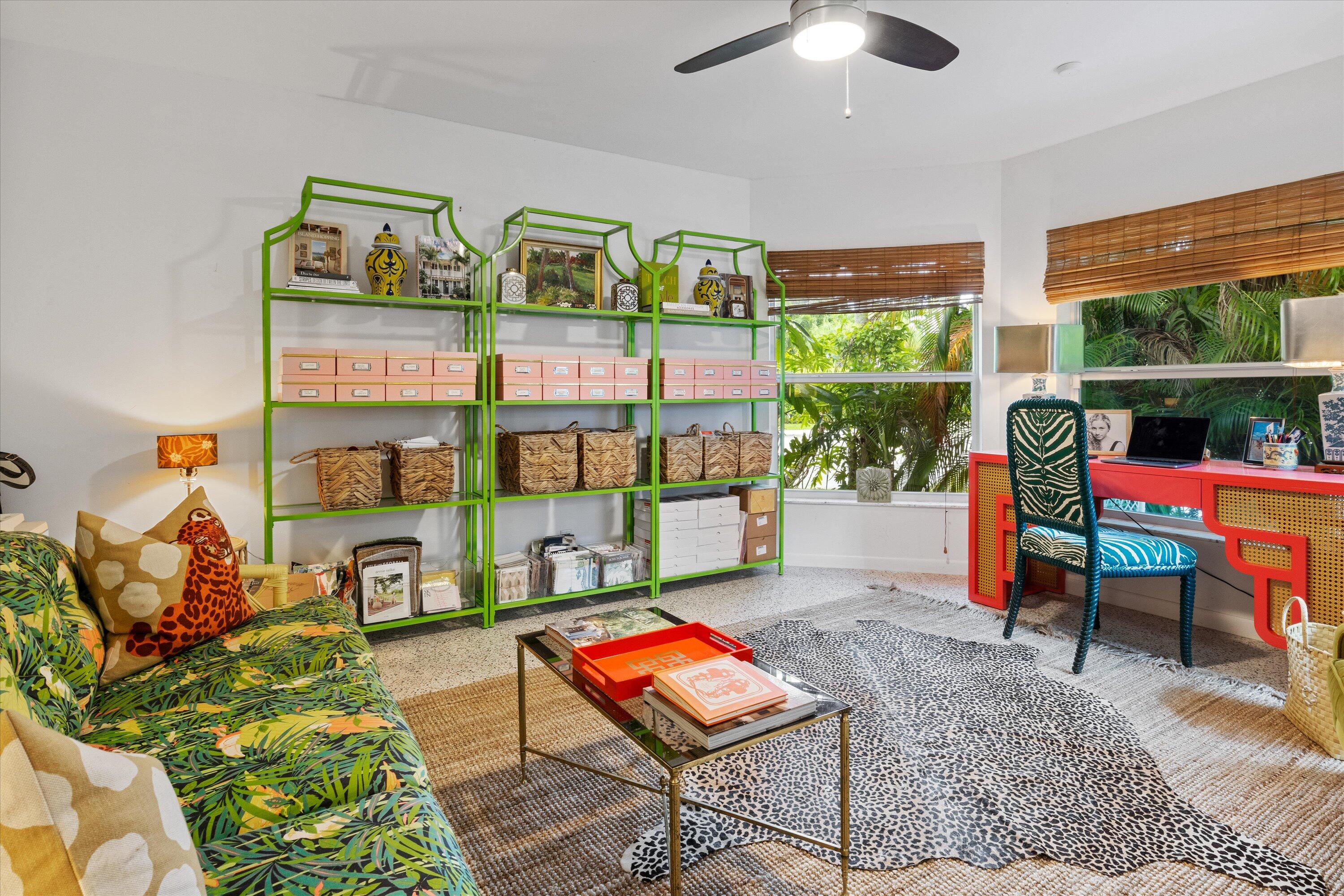 202 32nd Street West Palm Beach, FL 33407 - Photo 30 of 44 a living room with lots of furniture and a rug