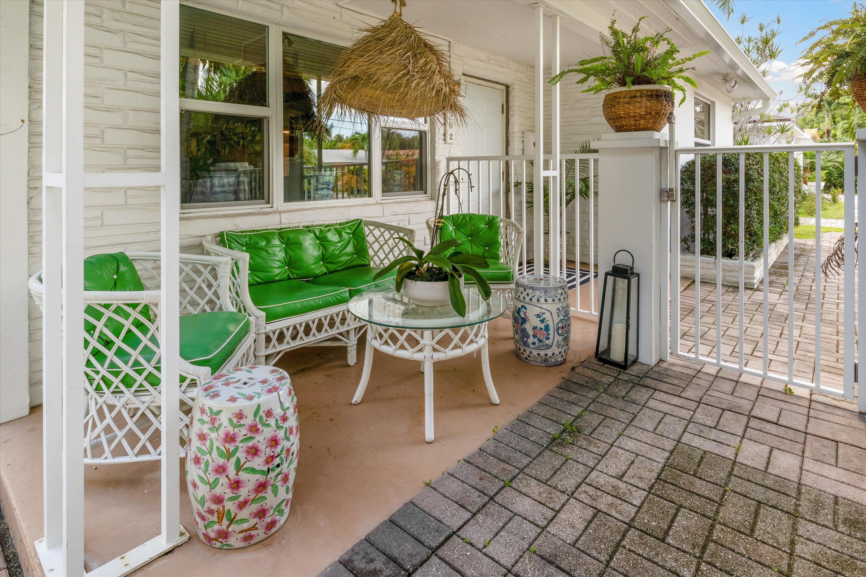 202 32nd Street West Palm Beach, FL 33407 - Photo 5 of 44 a view of a chair and table in the patio