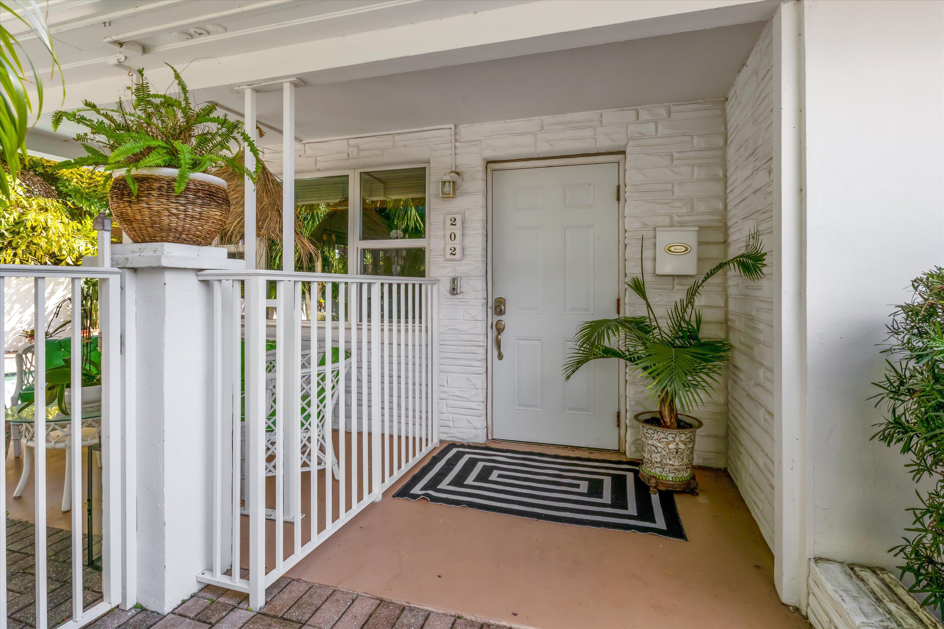 202 32nd Street West Palm Beach, FL 33407 - Photo 6 of 44 a view of backyard space with porch