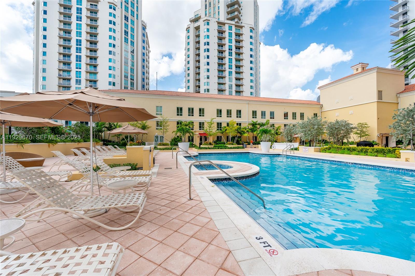 7350 Southwest 89th Street, Unit 1702S Miami, FL 33156 - Photo 22 of 29 a view of swimming pool with outdoor seating and city view