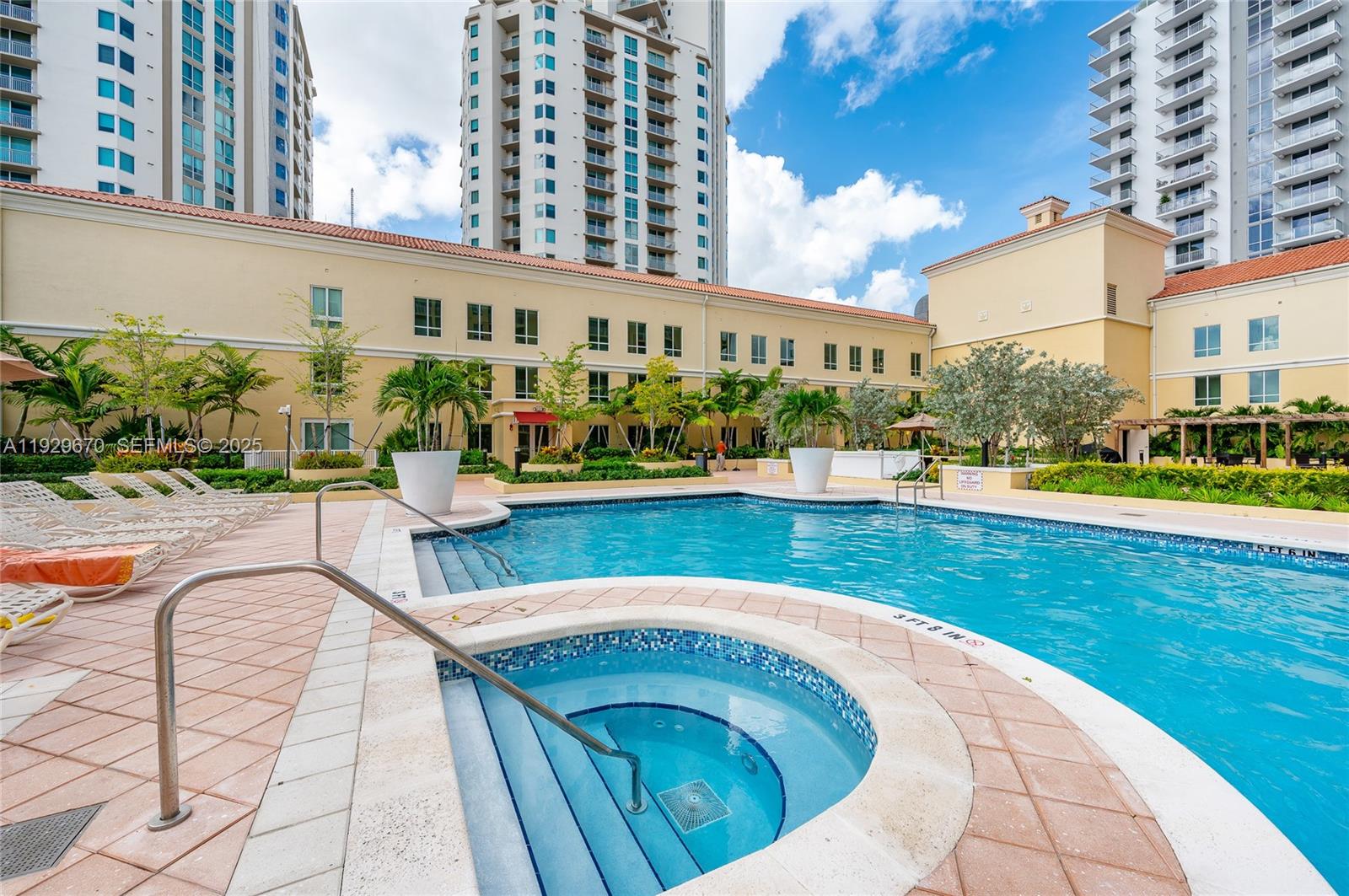 7350 Southwest 89th Street, Unit 1702S Miami, FL 33156 - Photo 23 of 29 swimming pool view with a outdoor seating
