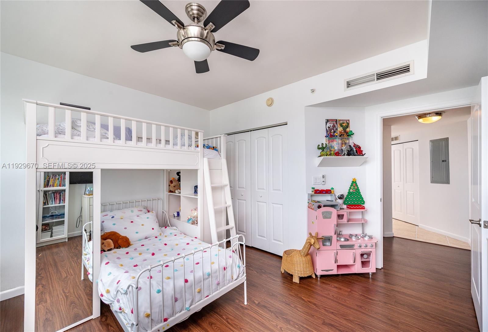 7350 Southwest 89th Street, Unit 1702S Miami, FL 33156 - Photo 9 of 29 a bedroom with bed and wooden floor