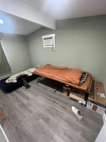 a kitchen with a sink a stove and cabinets