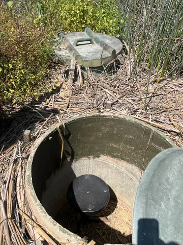 a view of a swimming pool with a chair