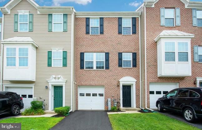 405 Signal Court, Unit 33 Bel Air, MD 21014 - Photo 1 of 43 a car parked in front of a house