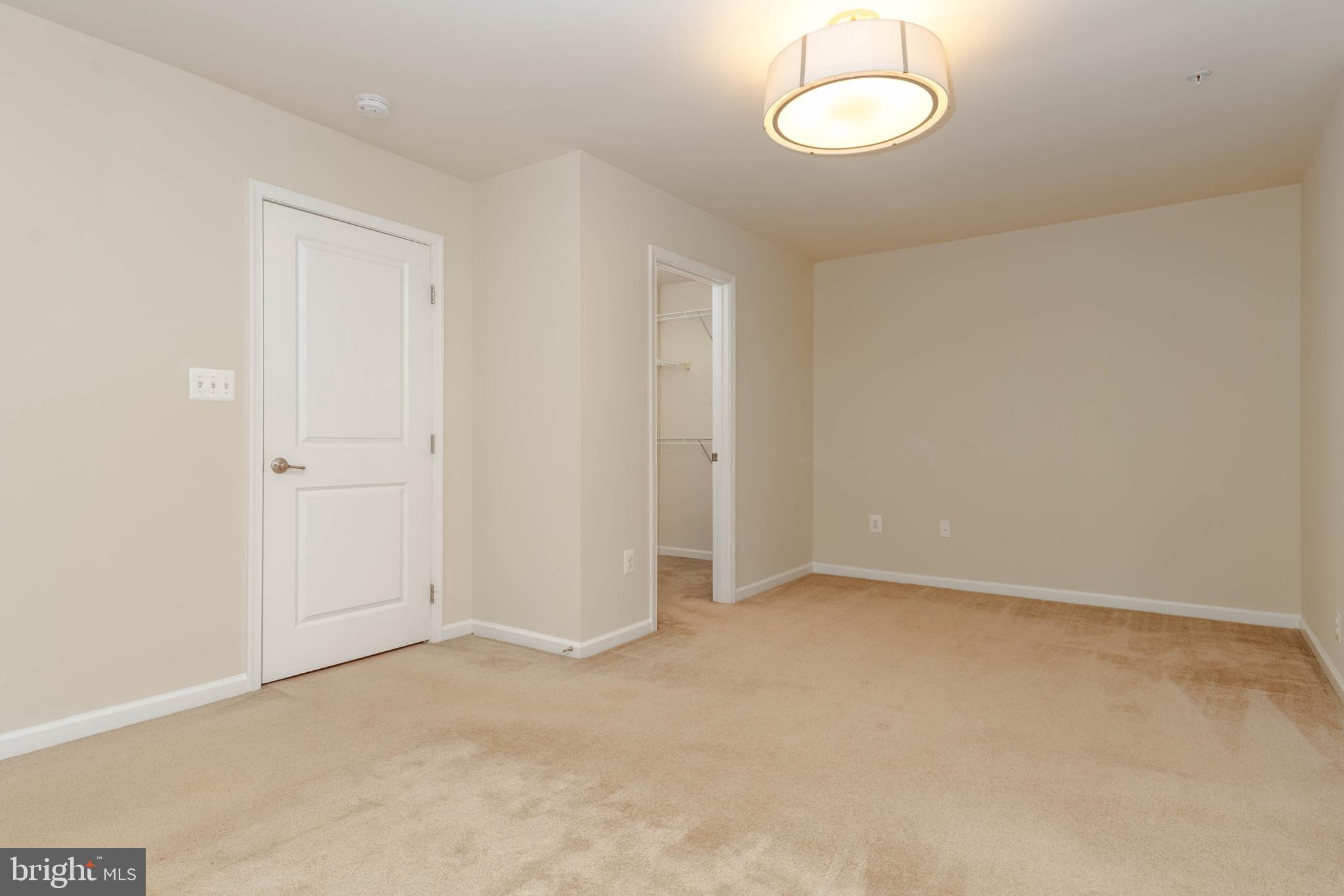 405 Signal Court, Unit 33 Bel Air, MD 21014 - Photo 18 of 43 an empty room with a fan